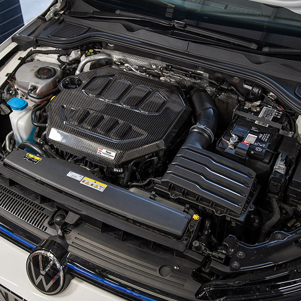 Forge carbon engine cover fitted in engine bay
